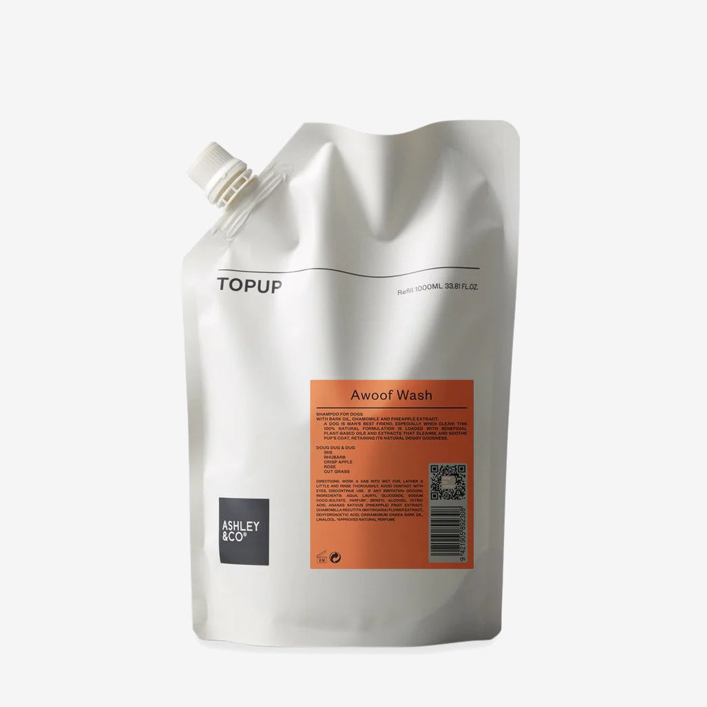 A white refill pouch labeled "TOPUP Awash Wash" by ASHLEY & CO against a white background.