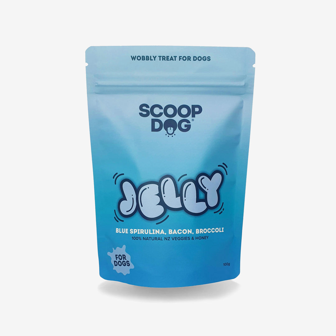 A blue pouch of Scoop Dog Jelly dog treats with spirulina, bacon, and broccoli.