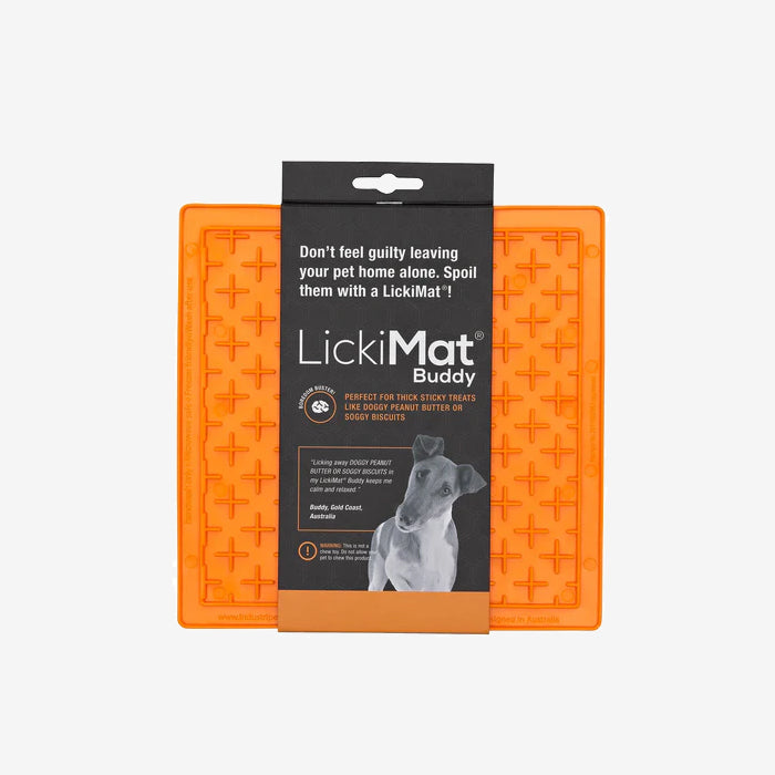 Orange LickiMat Buddy with packaging promoting it as a treat mat for pets, ideal for sticky foods like peanut butter.