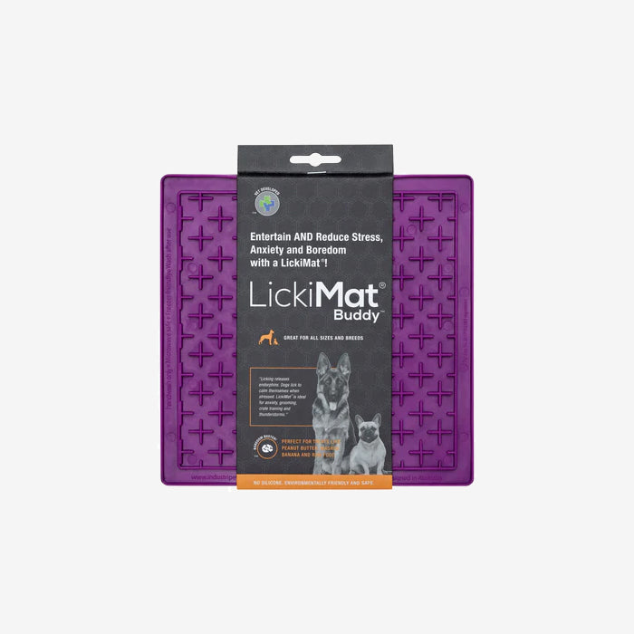 Product image of a purple LickiMat Buddy with packaging, designed to entertain pets and alleviate stress and boredom during mealtime.