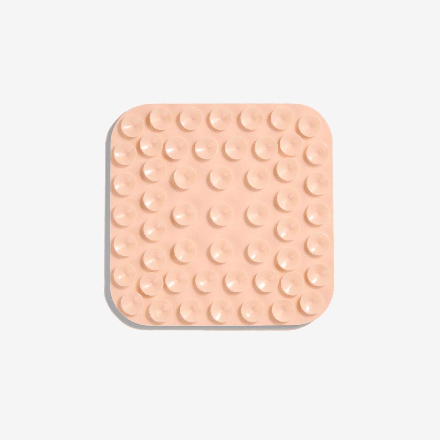 the back of a blush lickimat showing the suction cups