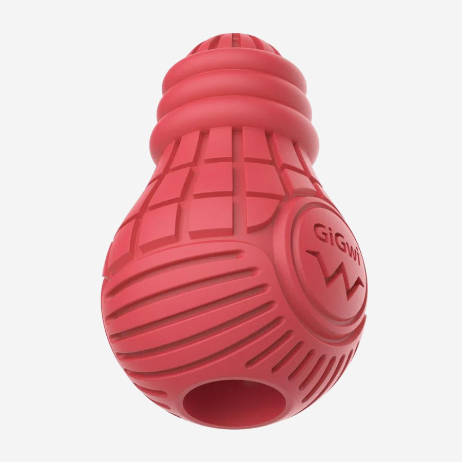 Red bulb shaped dog toy with a hollow center to put treats inside with exterior grooves.