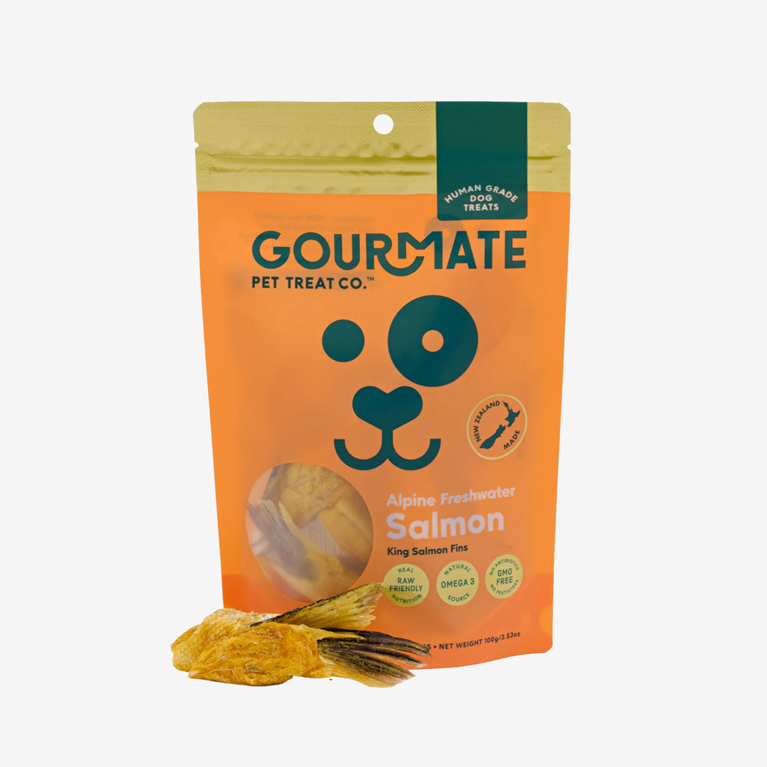 Package of GOURMATE Pet Treat Co. Alpine Freshwater Salmon dog treats with visible salmon fins.