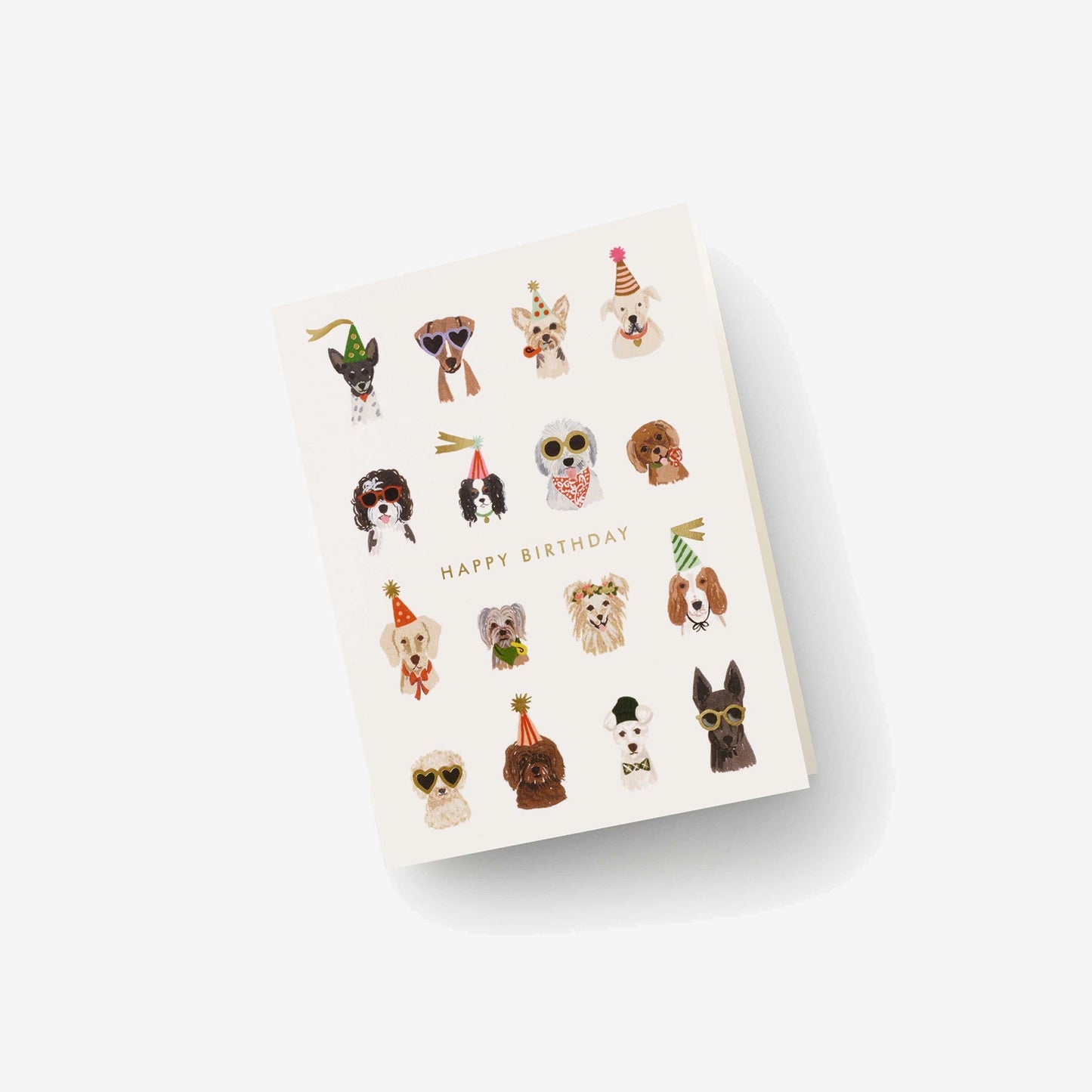 A whimsical birthday card featuring various illustrated dogs wearing festive hats and accessories, surrounded by the text "HAPPY BIRTHDAY."
