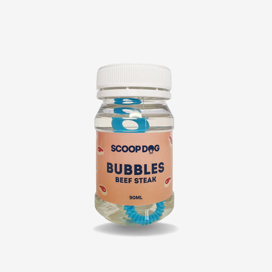 A jar of ScoopDog beef steak flavored bubbles for dogs, against a white background.