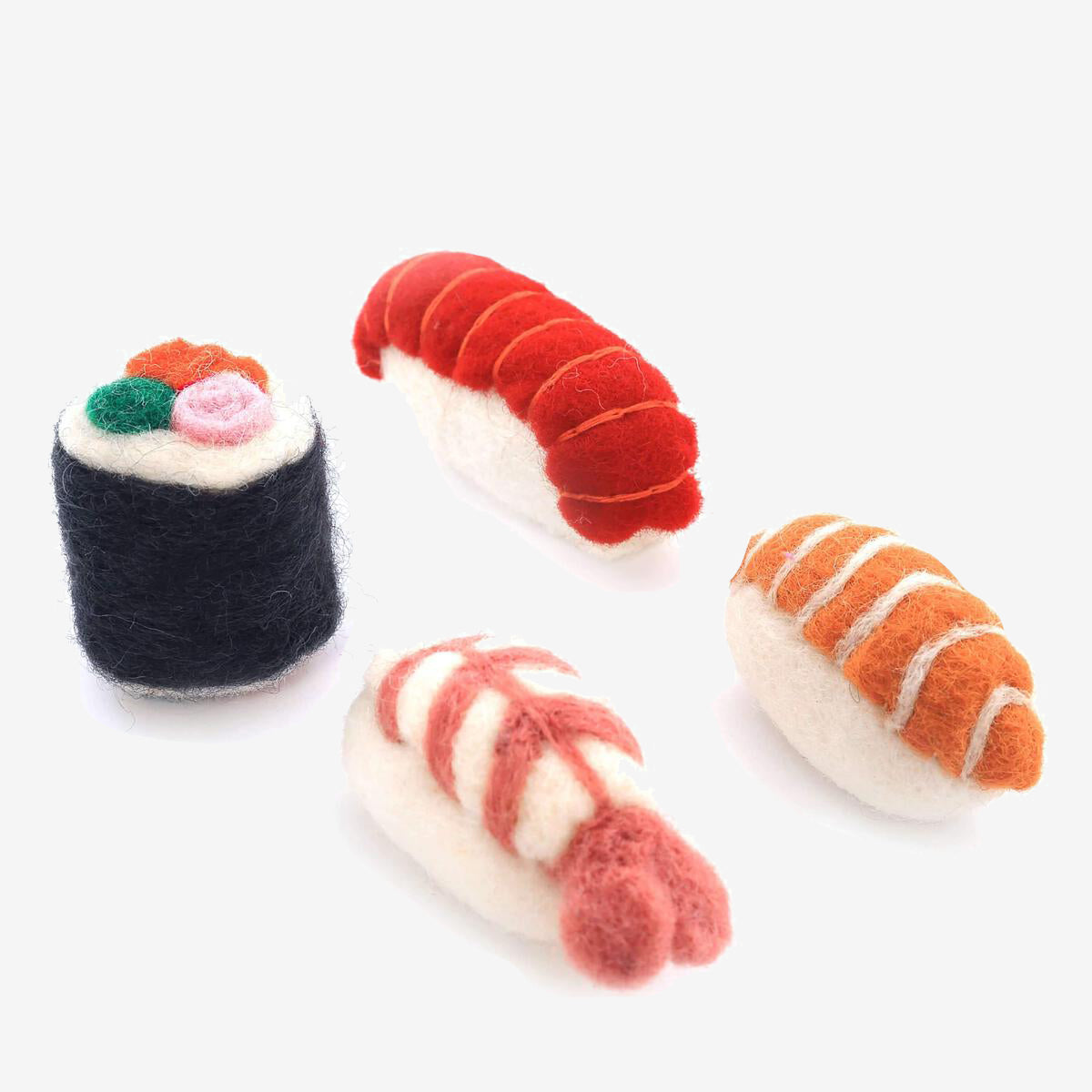 Four pieces of felt sushi on a white background.