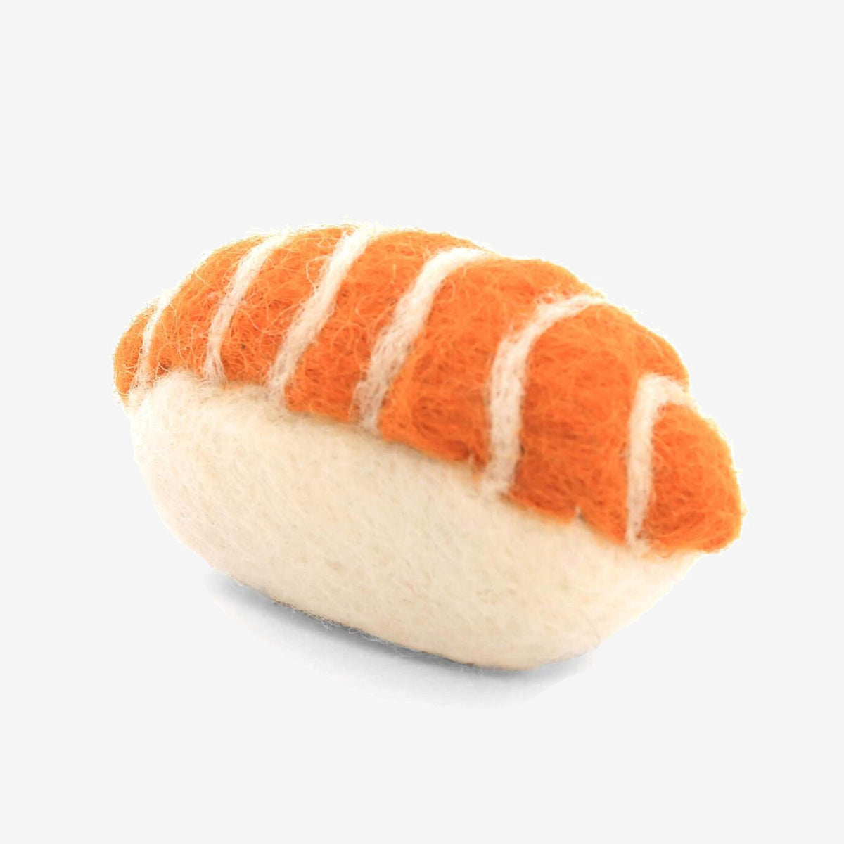A plush toy resembling a loaf of bread with orange and white colours on a white background.