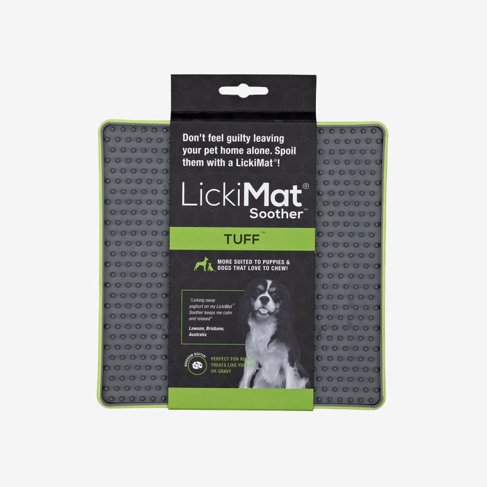 LickiMat Soother TUFF, a chew-resistant feeding mat for dogs, designed to calm pets while enjoying treats, with a playful dog image.