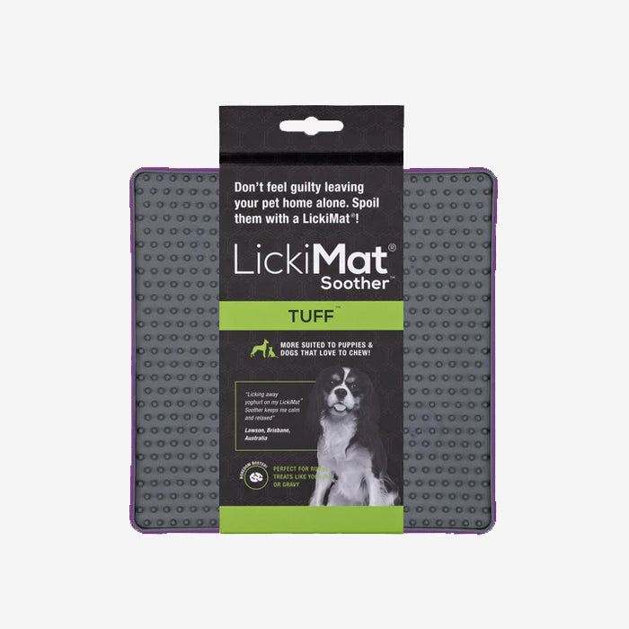 LickiMat Soother TUFF, a chew-resistant feeding mat for dogs, designed to calm pets while enjoying treats, with a playful dog image.