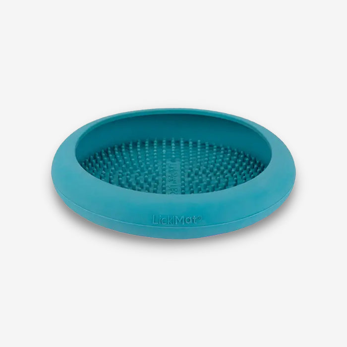 Turquoise silicone Lickimat with a textured surface, designed for pet licking and stimulation during feeding or playtime.