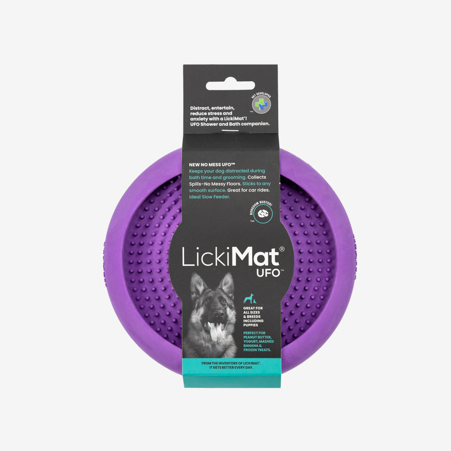 LickiMat UFO is a purple dog treat mat designed to distract pets during baths and grooming while preventing spills.