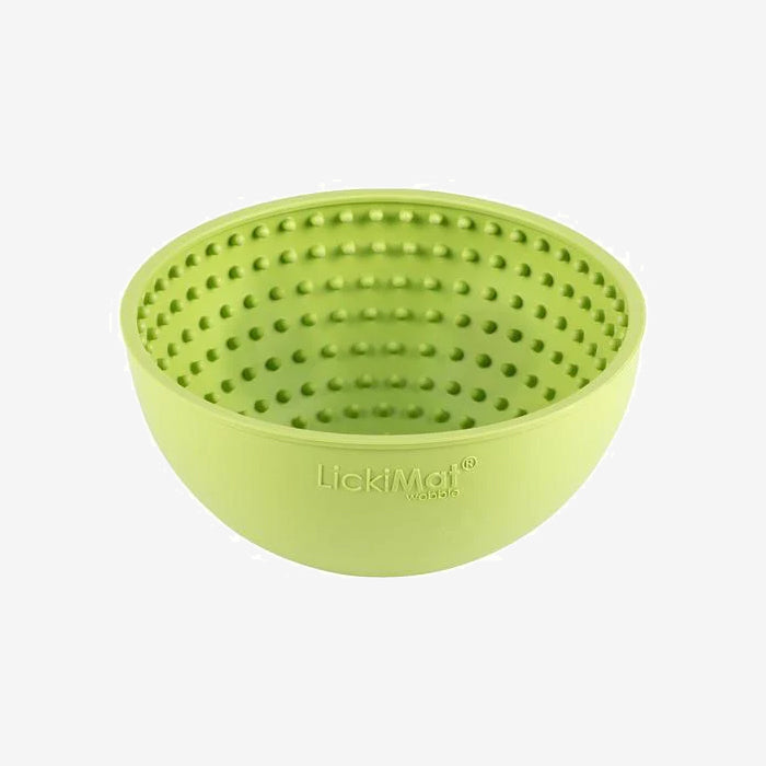 Green LickiMat Wobble bowl with textured interior, designed for pet enrichment during mealtime or treats.