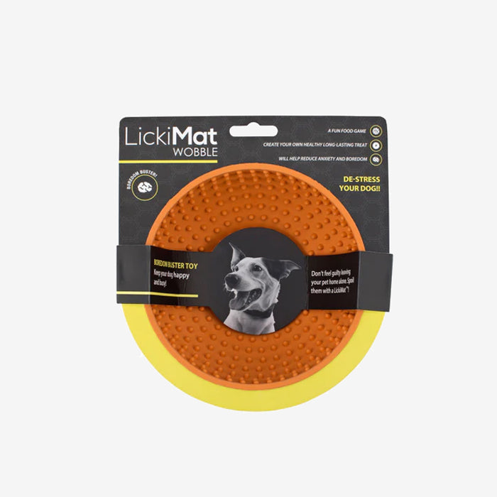 LickiMat Wobble dog toy in orange and yellow packaging, designed to reduce anxiety and boredom with DIY treats.