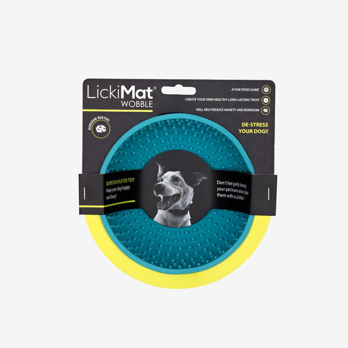 A LickiMat Wobble dog toy in blue and yellow packaging promoting stress relief and boredom reduction for pets.