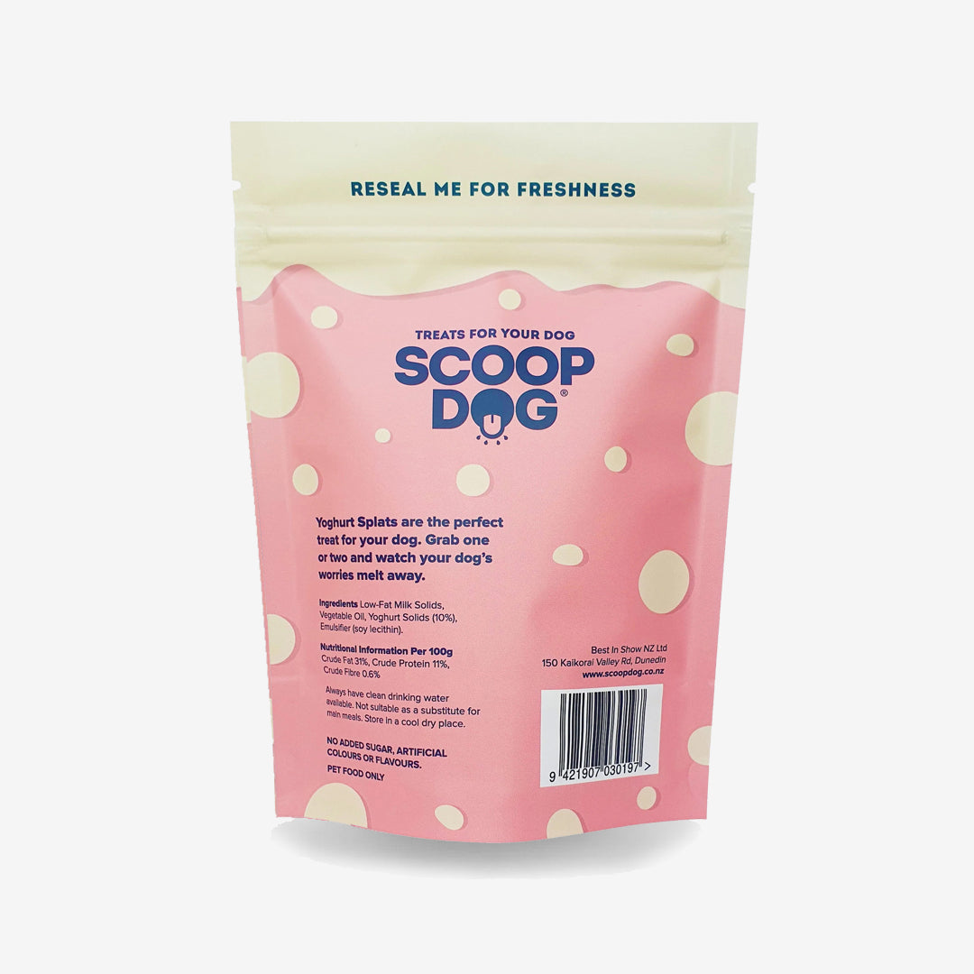 A pink dog treat package labeled "SCOOP DOG" with white dots and nutritional information.