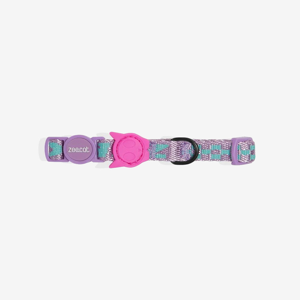 A purple and teal patterned cat collar with a pink breakaway buckle and a tag ring.