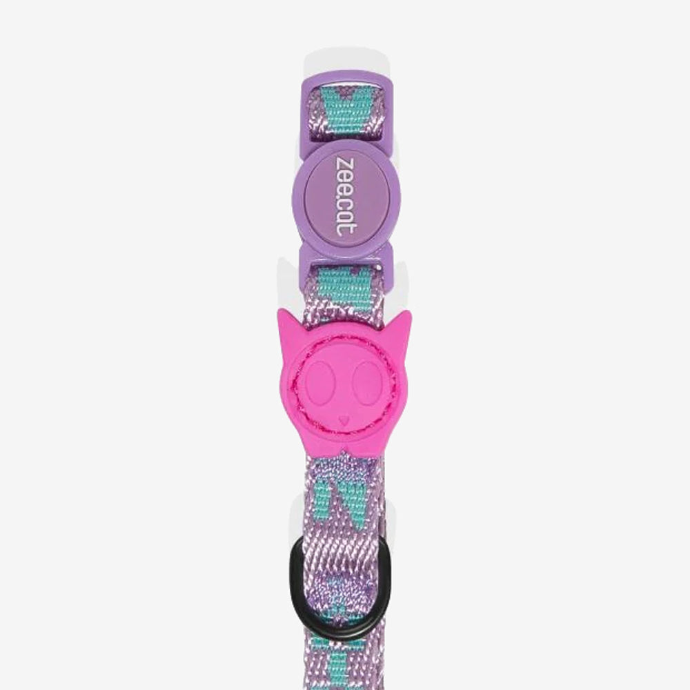 A purple and teal patterned cat collar with a pink breakaway buckle and a tag ring.