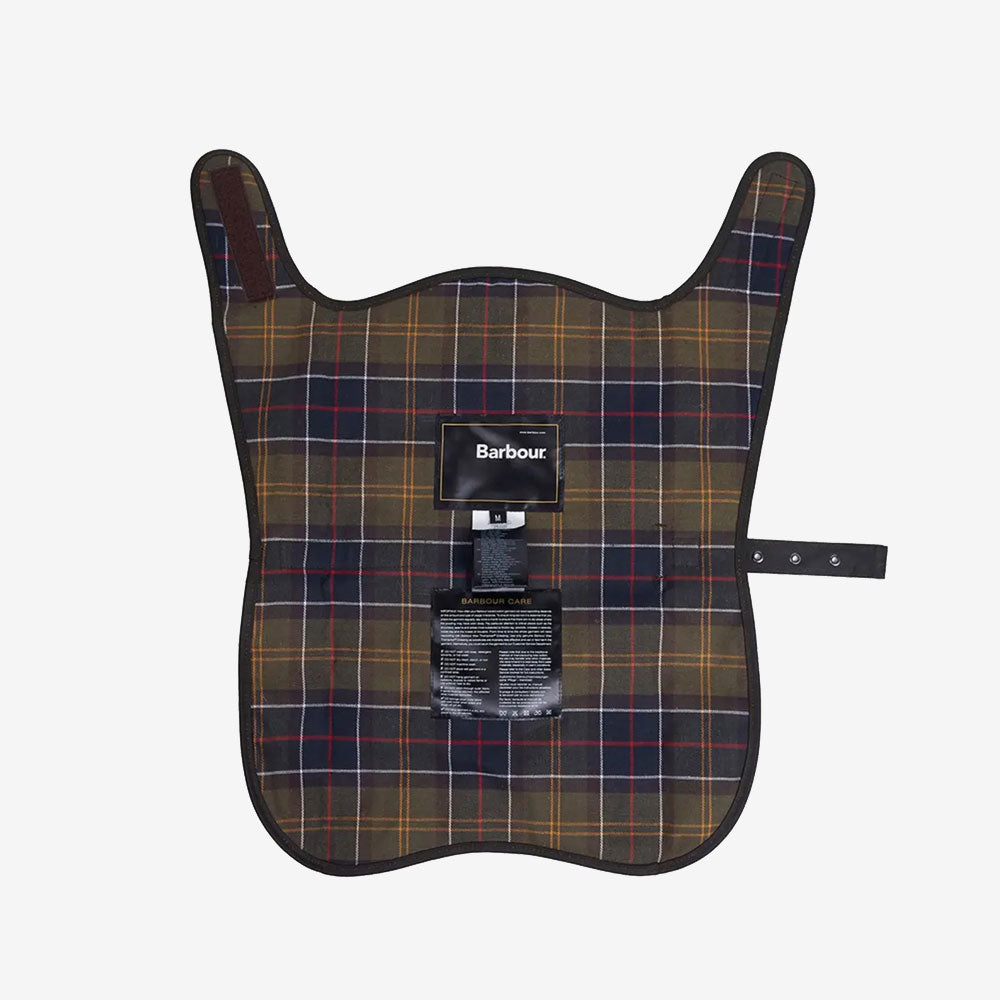 Barbour dog inner jacket, featuring a plaid design in dark colours, with care instructions attached at the centre.