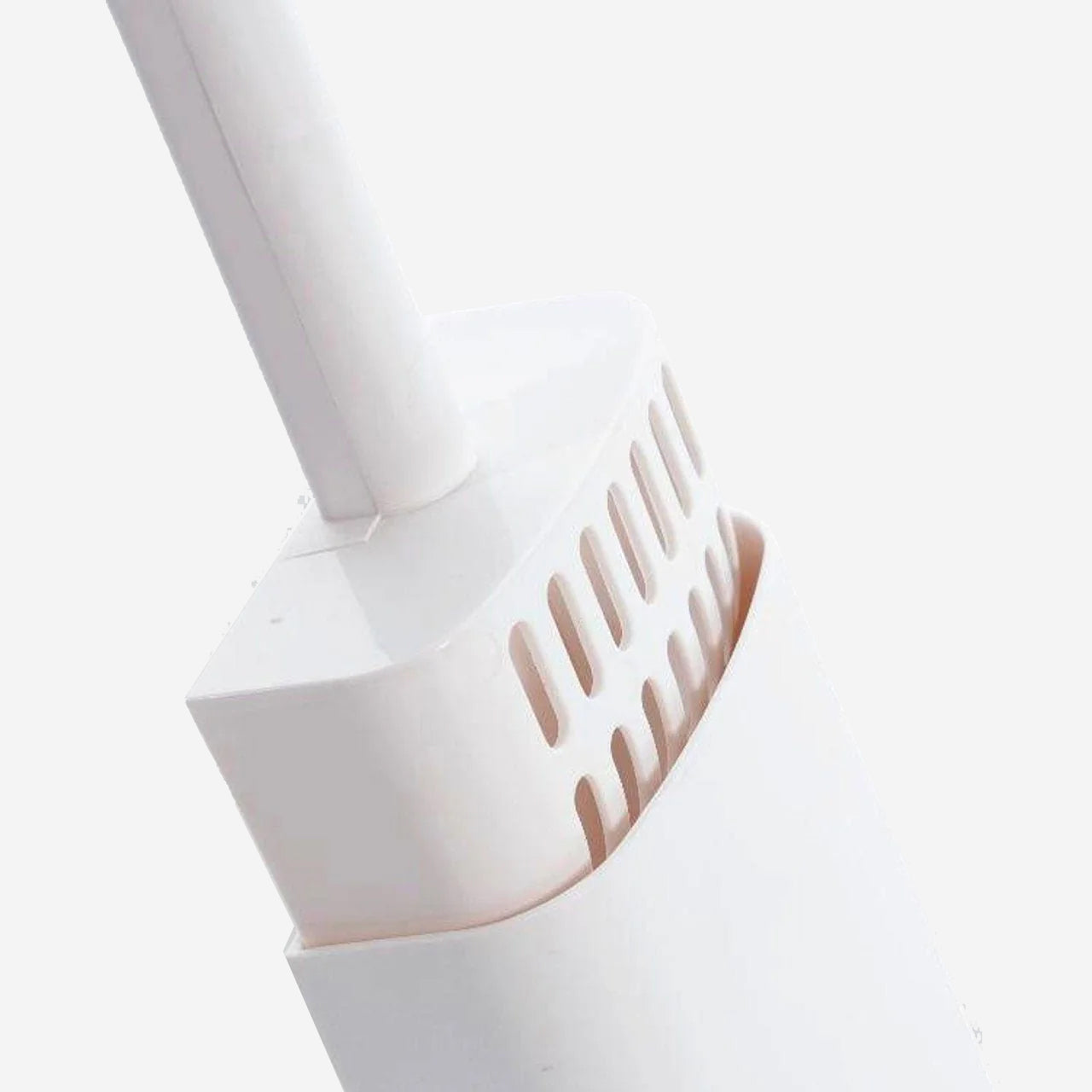 White cat litter scoop with holder on a plain background.