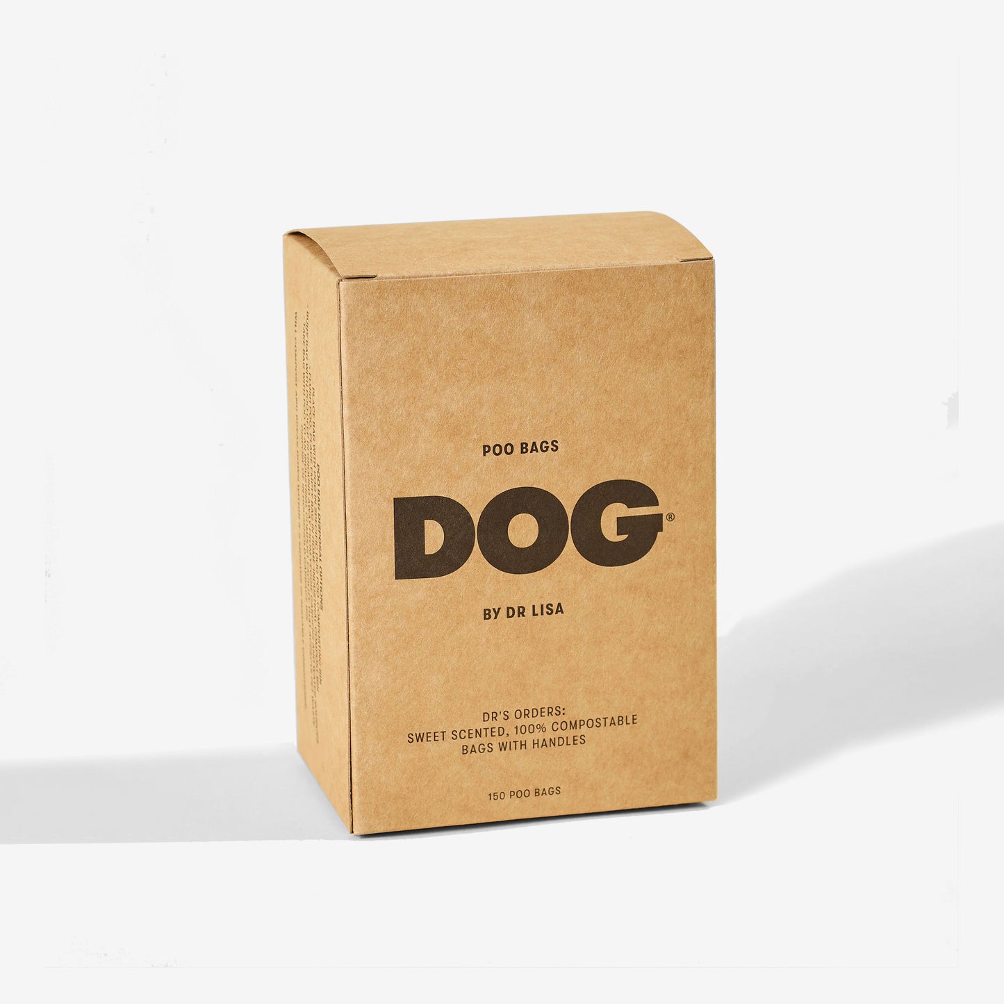 A cardboard box of dog poo bags labeled "DOG by Dr Lisa" with product information.