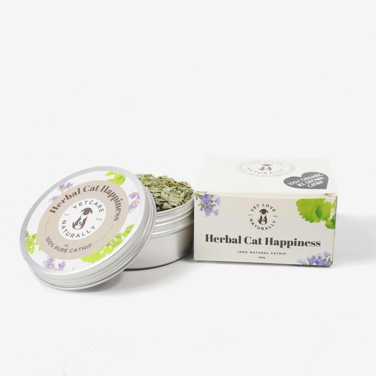 Container of catnip labeled "Herbal Cat Happiness" next to its packaging on a white background.