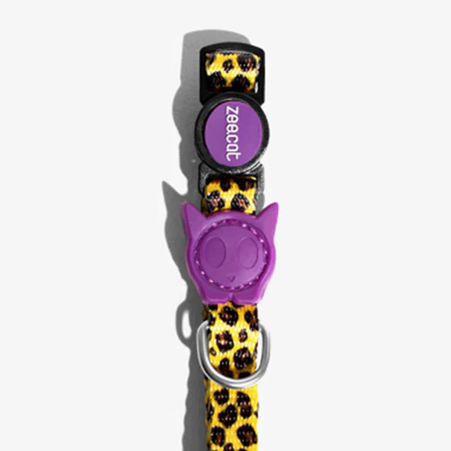 Purple leopard print cat collar featuring a purple cat-shaped charm and a black buckle with "zeecat" logo.