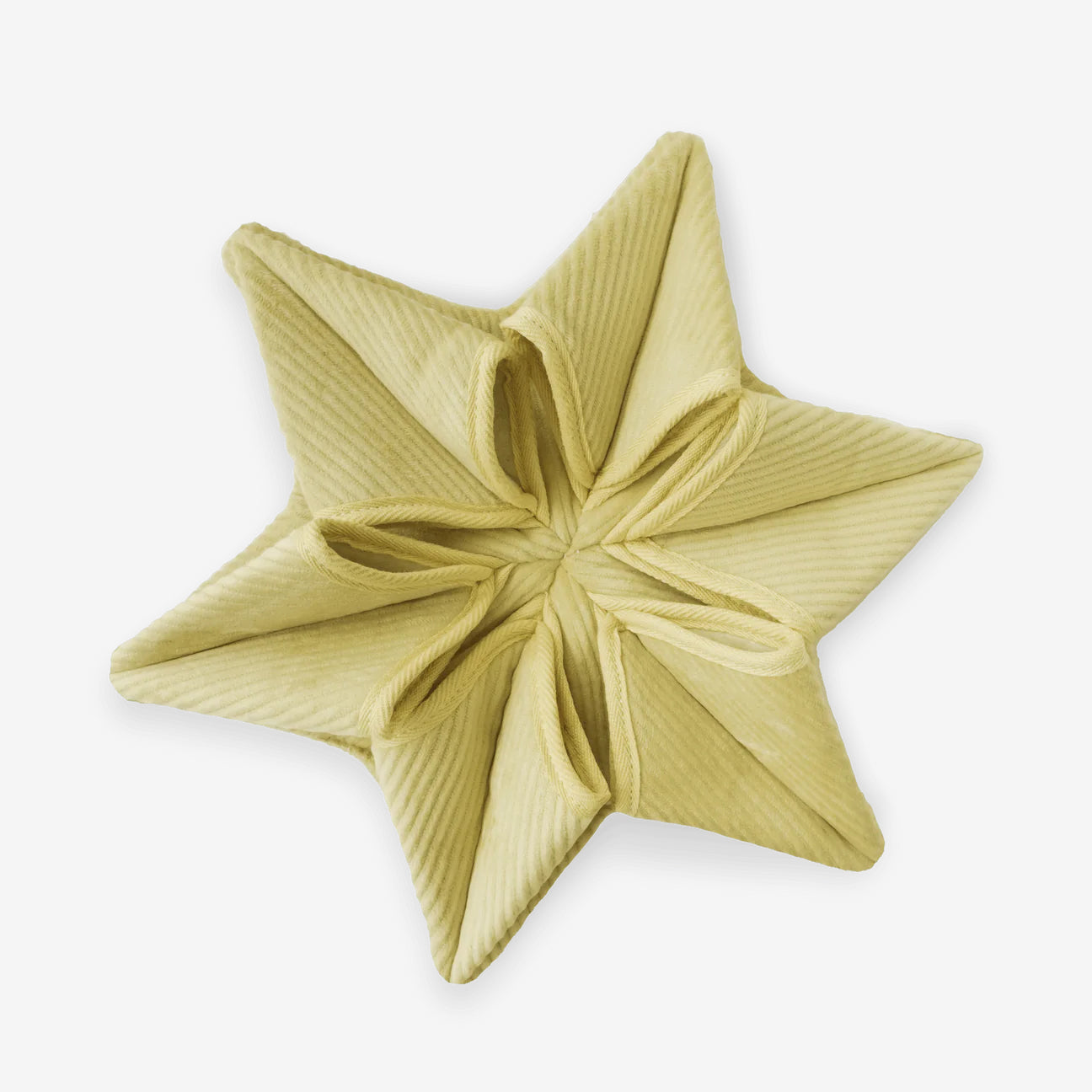Close up of Lambwolf Collective's small flower shaped snuffle matt in yellow, sitting on a white background.