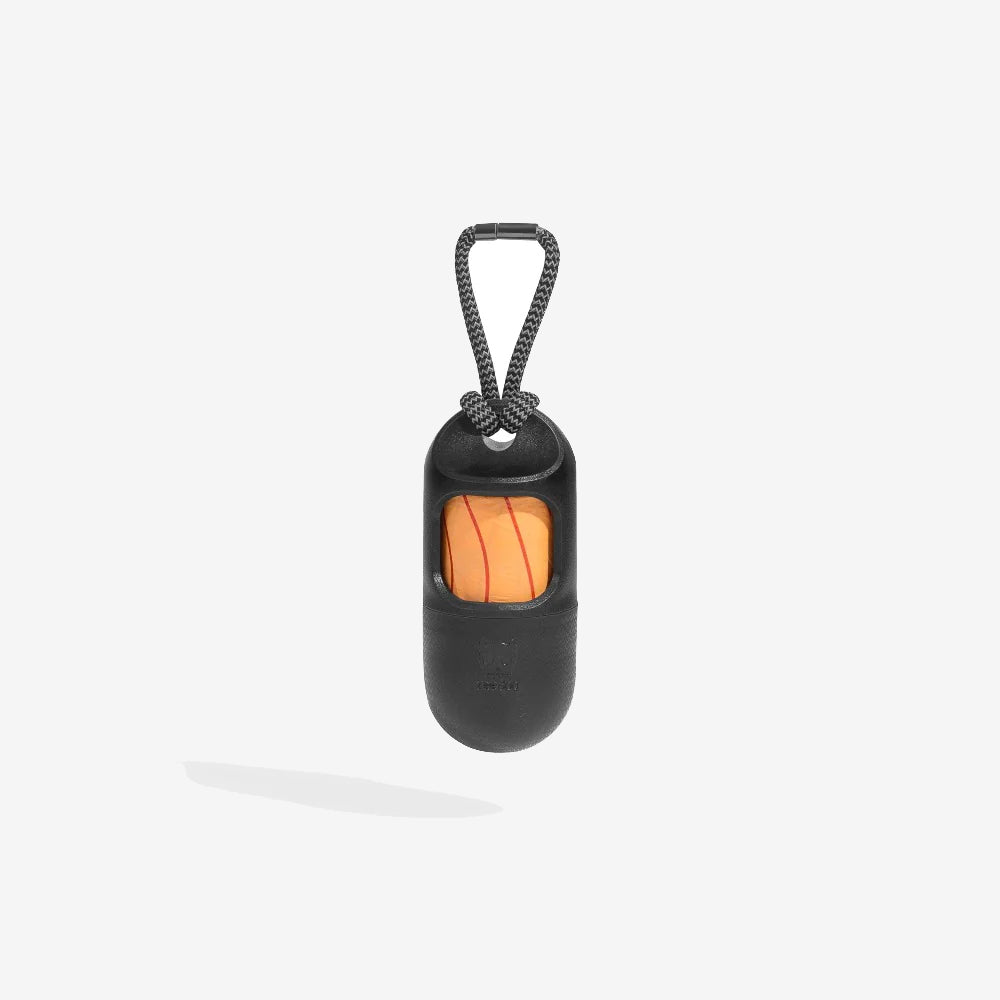 Black portable poo bag case with an orange poo bags and a textured surface, secured with a braided black cord.