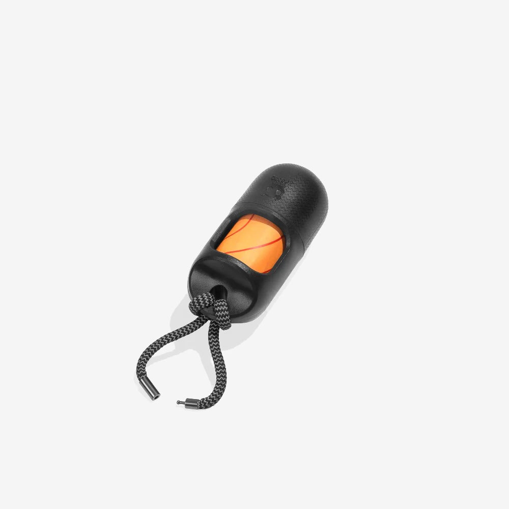 Black portable poo bag case with an orange poo bags and a textured surface, secured with a braided black cord.