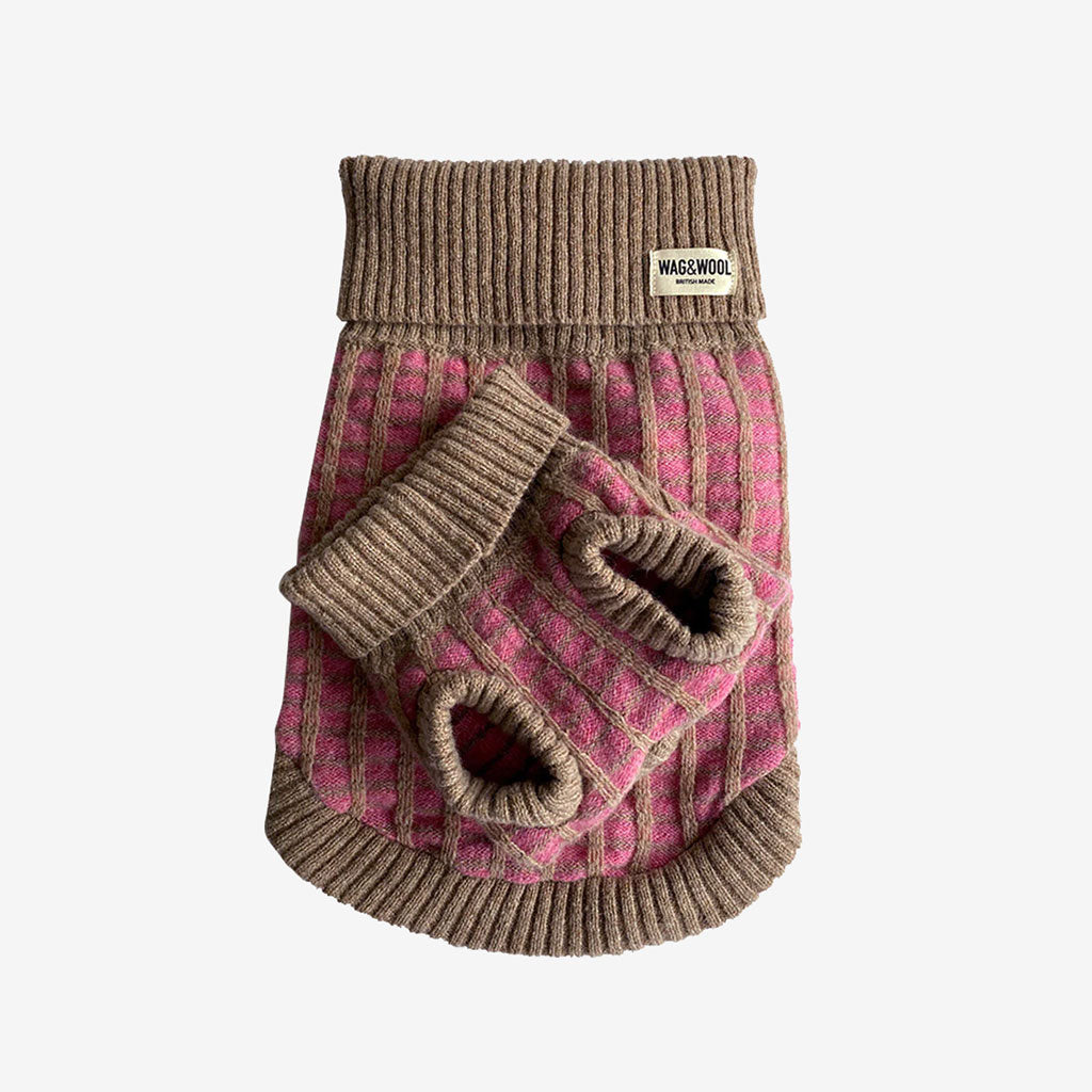 Cozy pink and beige striped dog sweater with matching dog mittens, featuring ribbed cuffs and a Wag & Wool logo tag.