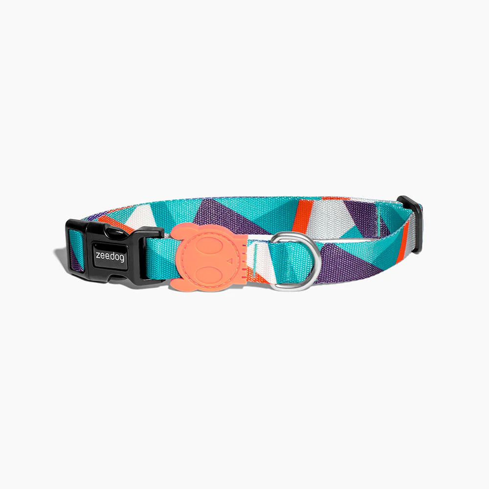 Colourful geometric-patterned pet collar by Zee.Dog featuring a secure black buckle and playful rubber logo tag.