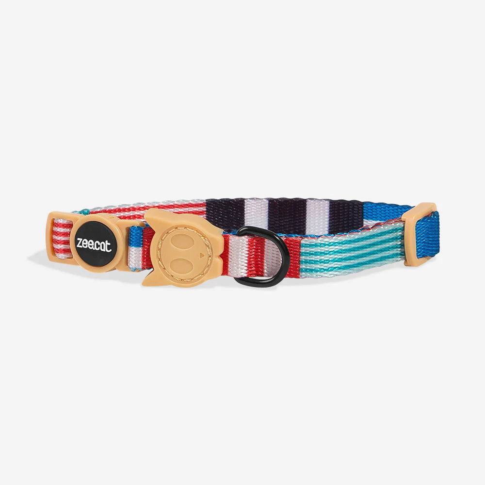 Colourful cat collar featuring a mix of stripes in red, blue, and purple with a cute golden fish-shaped buckle.