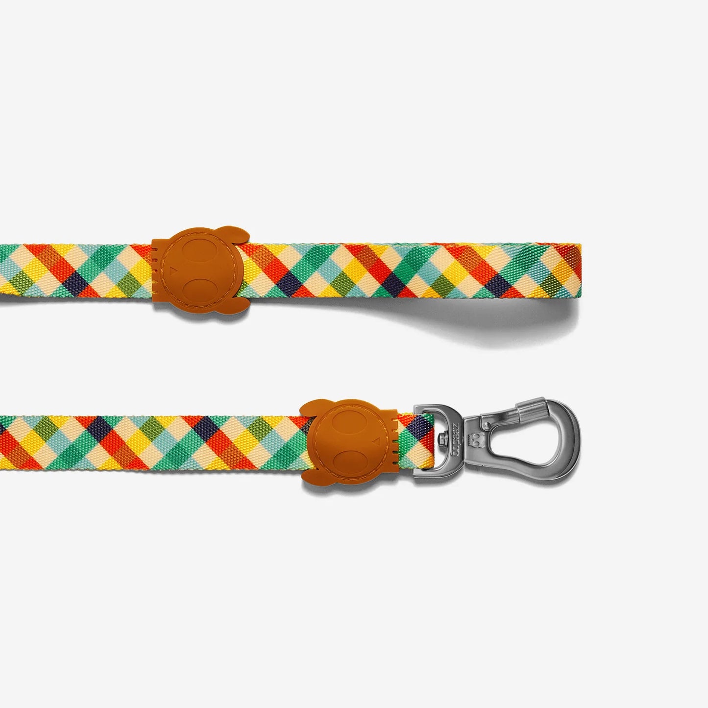 Colourful plaid dog leash with yellow, red, green, and blue diamonds, featuring brown leather accents and a silver clip hook.