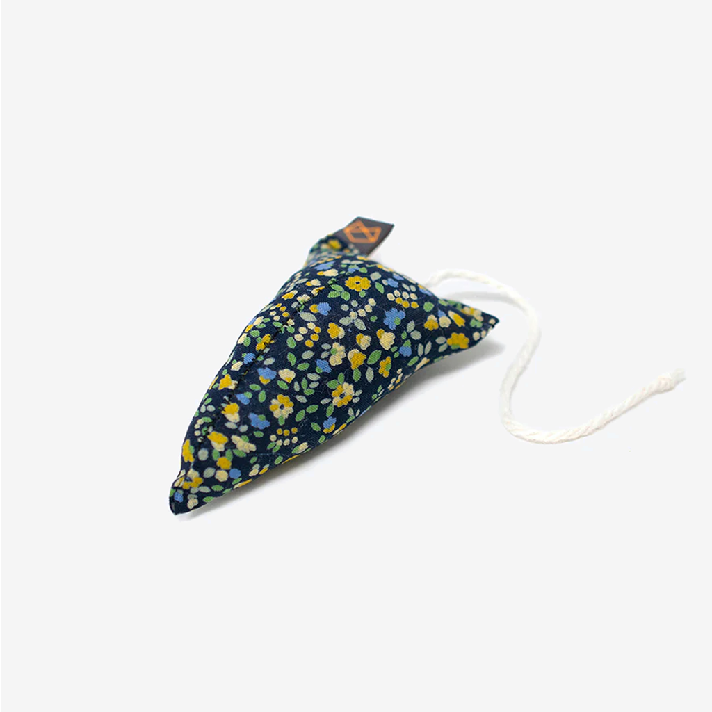 A floral-patterned fabric cat toy shaped like a fish, featuring a white rope for easy handling.