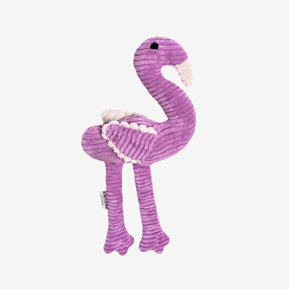 a lilac flamingo plush dog toy with a cream bill and inner wings