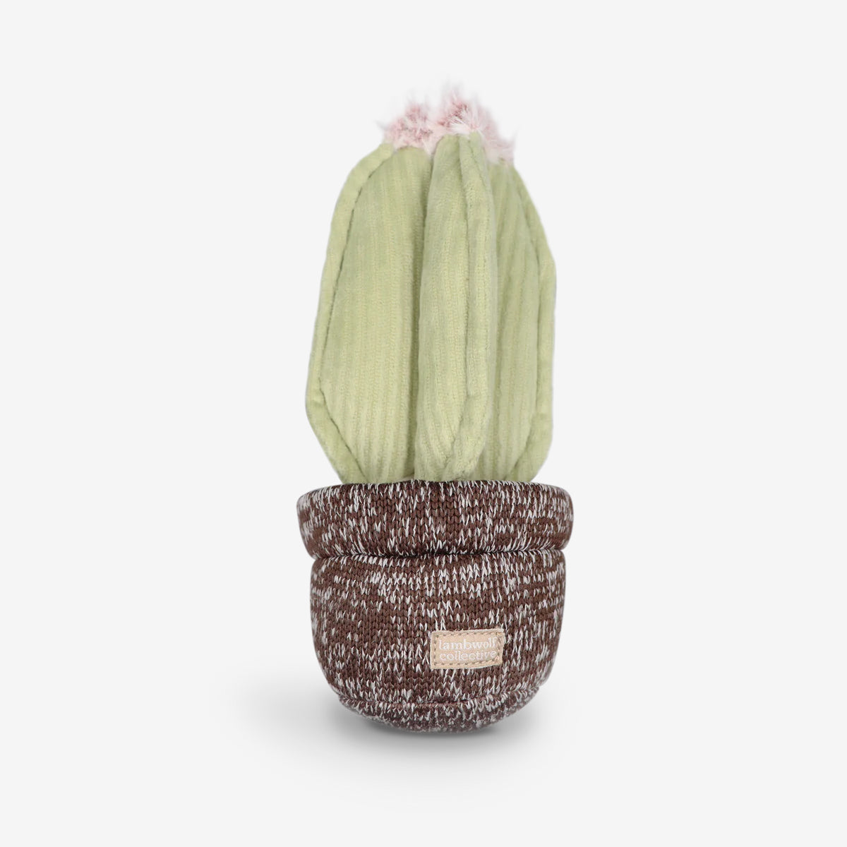 A plush pale green cactus dog toy, with pink fluff at the top sat in a soft brown shaped pot. 