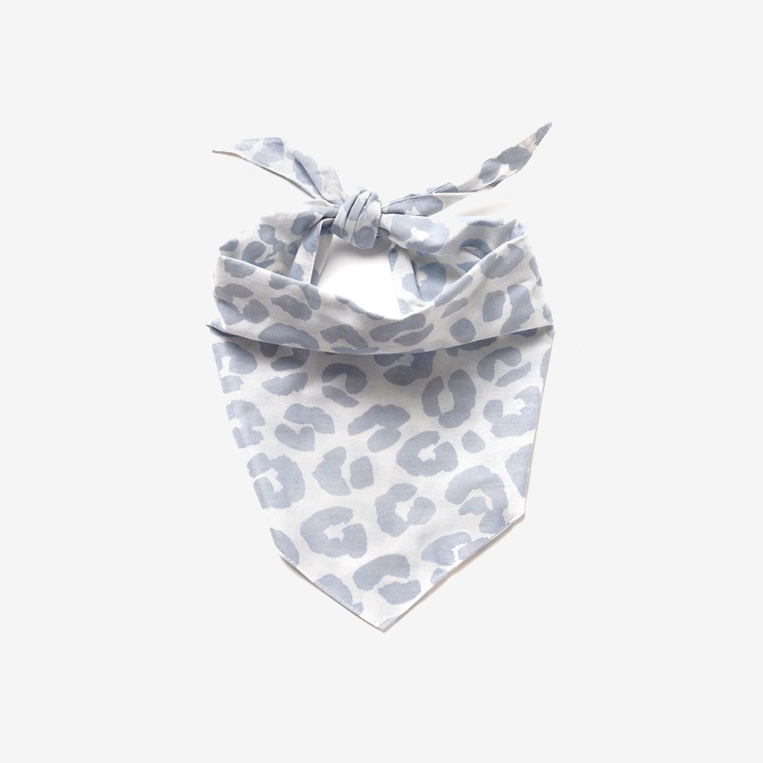 A 100% cotton dog bandana with a pale blue cheeter print on white