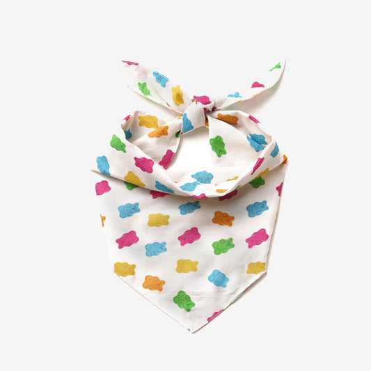 Dog bandana with multi coloured gum bears on a cream cotton fabric