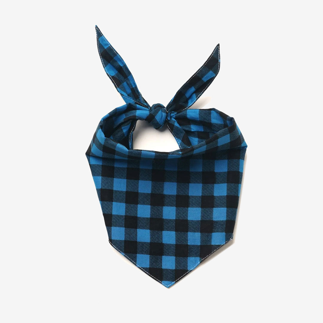 A plaid checkered dog bandana in blue and black