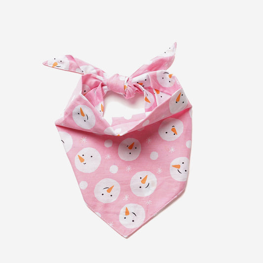 100% cotton dog bandana with patterned with snowmen faces on pink fabric