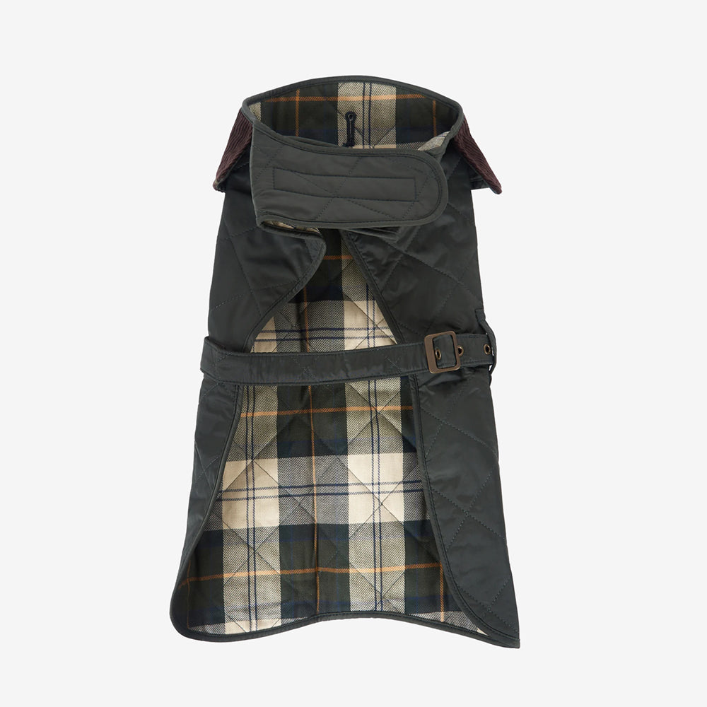 Quilted dog coat with a dark green exterior and a stylish plaid lining, featuring a buckle strap for secure fastening.