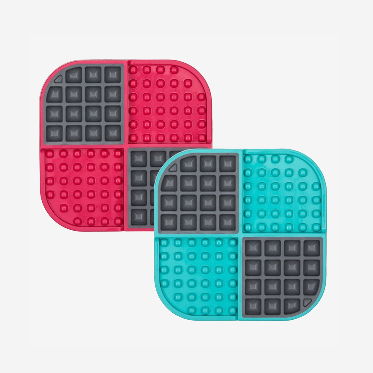 Two square silicone kitchen gadgets, each divided into quadrants. One is red and gray, the other is teal and gray, with raised dots and waffle-like textures.