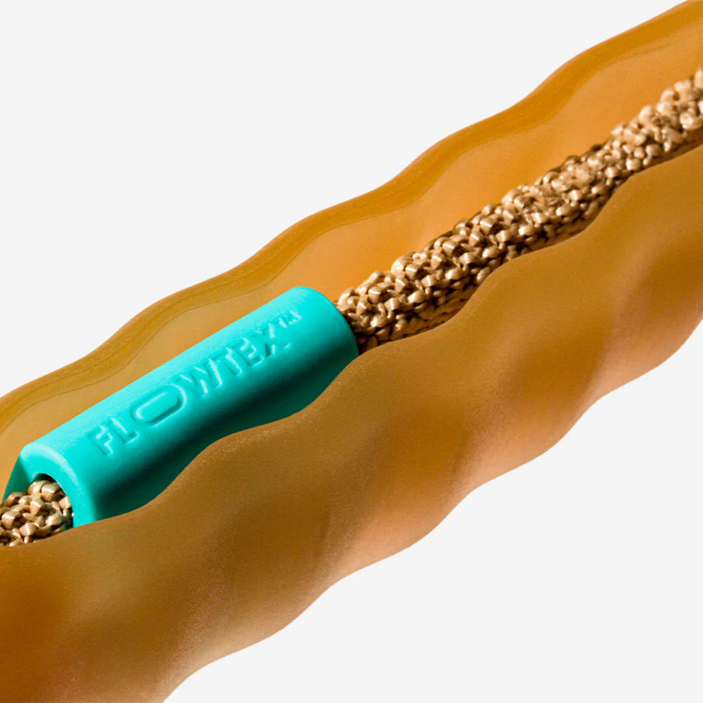 Close up of Zee Dog carbon airleash in a sand colour. Featuring a turquoise flow tex toggle.