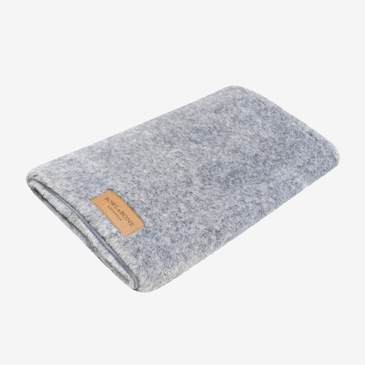 a grey coloured plush dog blanket