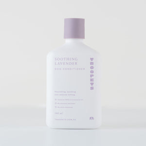 White bottle of Troopets Soothing Lavender Dog Conditioner with a lavender cap, featuring essential oil and soothing properties.